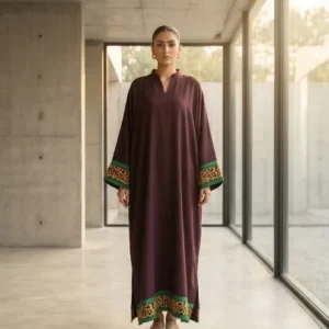 Detailed calligraphy on chocolate brown georgette kaftan.