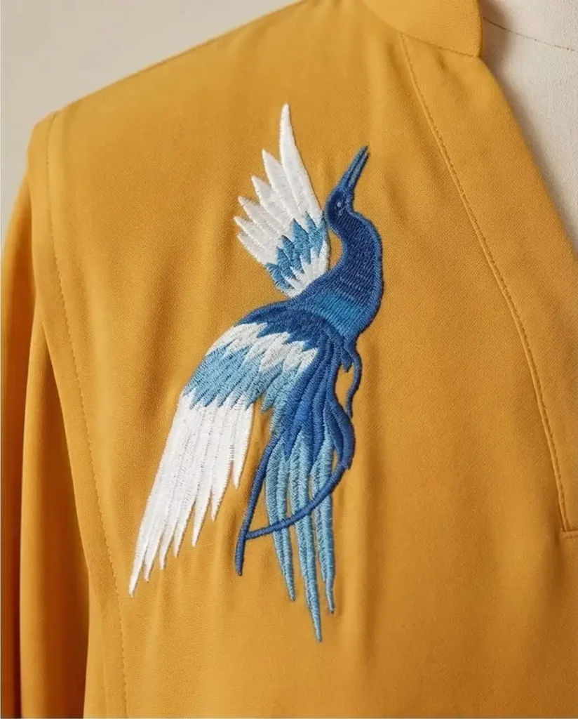 Mustard georgette kaftan with pintucks embroidered birds detailing.